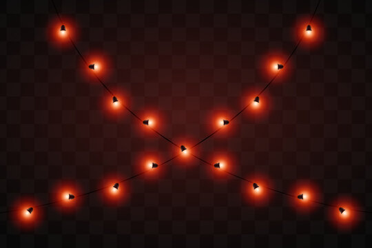 Festive lights. String of glowing red lights arranged at an angle. Ideal for decorating events, holidays, or outdoor settings. The dark background highlights the glowing elements.
