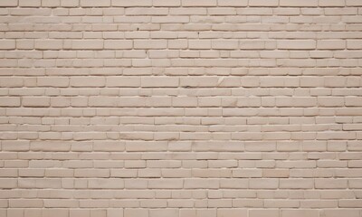 Obraz premium A light beige brick wall with vertical rows of bricks
