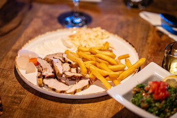 fried chicken with french fries and nuggets meal - junk food and unhealthy food