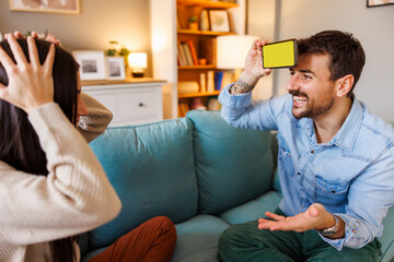 Couple playing leisure games at home