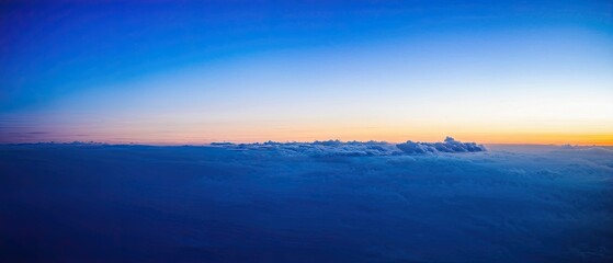 Fototapeta premium Aerial View of Clouds During Sunset