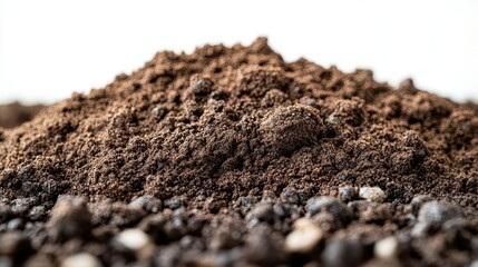 closeup of a dirt pile isolated on a white background highlighting the texture and earthy tones ideal for agricultural or environmental contexts