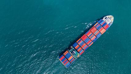 Cargo container ship carrying container and running out international container port customs shipyard sea port concept smart logistic service. © Yellow Boat