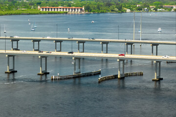 Barron Collier Bridge and Gilchrist Bridge in Florida with moving traffic. Transportation...