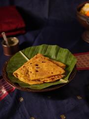 Indian sweet Puran poli roti with the sweet filling inside
