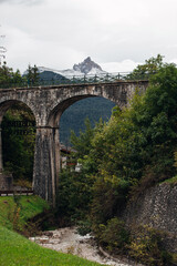 Old aqueduct arch over a dried up river in Austria