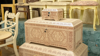 Traditional Asian wooden chests with carved ornaments. Close-up. High quality photo