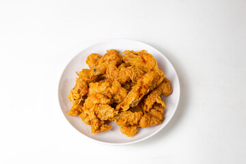 Crispy shrimp served on a white plate