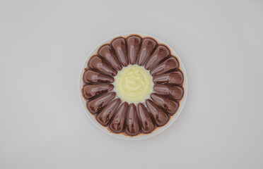 chocolate pudding with delicious white fla cream in the middle.