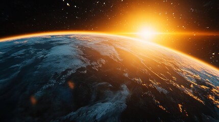 A stunning view of Earth from space, highlighting the vibrant sunrise on the horizon.