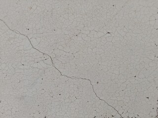 Cracked and Weathered White Surface with Fine, Dried Patterns, Highlighting Natural Wear, Aging, and Subtle Fragility