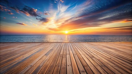 Peaceful empty wooden deck overlooking sunset ocean horizon