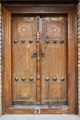 Old wooden carved door Bukhara, Uzbekistan