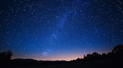 Naklejka premium A starry night sky background, perfect for dreamy designs.