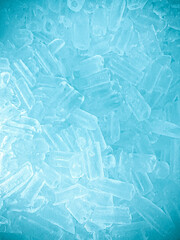 Obraz premium Ice cubes background, ice cube texture or background It makes me feel fresh and feel good, In the summer, ice and cold drinks will make us feel relaxed, Made for beverage or refreshment business.