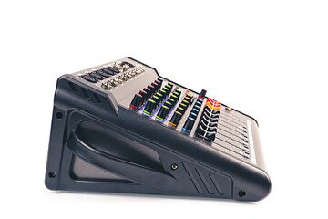 Side view of audio mixing console with clipping path isolated on white background.