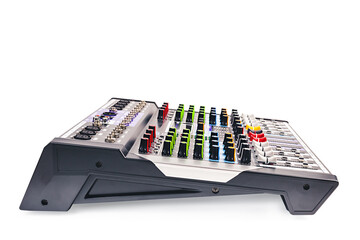 Side view of audio mixing console with clipping path isolated on white background.