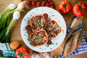 Ham and mini pizzas with mushrooms. Top view table with  decoration.