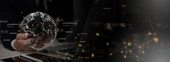 A businessman holding a digital globe with glowing network connections, symbolizing global communication and technology.