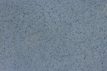 Luxurious ice-cold blue polished dotted marble surface, creative abstract background. Chaotic spots and dots of various shades of blue color.