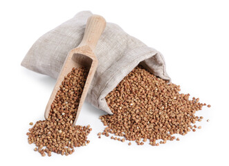 Raw buckwheat in burlap with scoop isolated on white