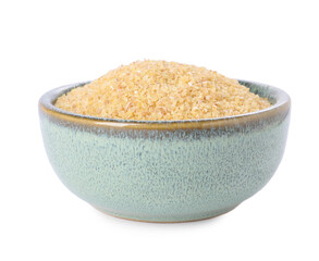 Raw wheat groats in bowl isolated on white