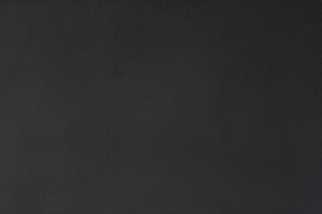 Grainy matte black plastic surface