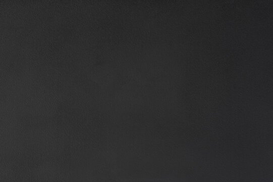 Grainy matte black plastic surface
