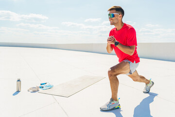 Athlete Performing a Lunge Workout on a Sunny Rooftop in an Urban Setting During the Afternoon