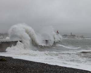 Newlyn harbour crashing waves
