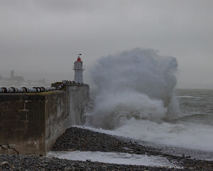 Newlyn harbour crashing waves