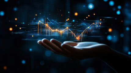 A digital hand projecting a visual representation of financial growth amid glowing particles in a virtual setting at night