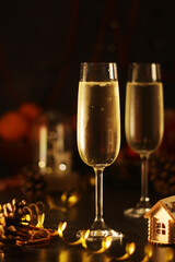 Two glasses with champagne in New Year Eve and Christmas style	