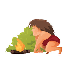 Caveman is fanning the fire. A wild woman, a Neanderthal in hide clothing makes a fire for cooking. Vector illustration in flat cartoon style