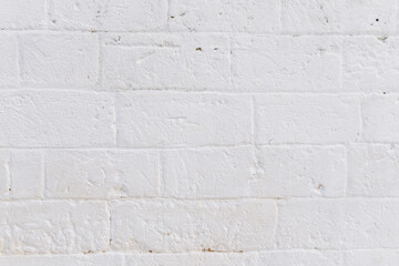 Wall white brick wall texture background. Big brick of tuff wall by an italian house. Brickwork stonework