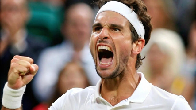 tennis player celebrating victory with passionate expression