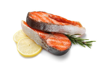 Tasty grilled salmon steaks, lemon and rosemary isolated on white