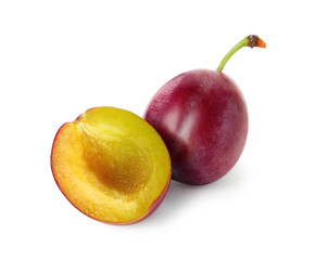 Whole and cut ripe plums isolated on white