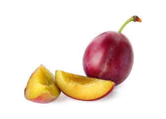 Whole and cut ripe plums isolated on white
