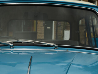 View of street through view of window of old vintage car 