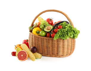 Different fresh vegetables and fruits in wicker basket isolated on white
