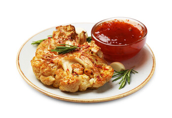 Delicious baked cauliflower steaks with sauce, garlic and rosemary isolated on white