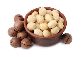 Macadamia nuts in bowl isolated on white