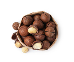 Macadamia nuts in paper bag isolated on white, top view