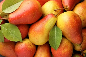 Fresh ripe juicy pears as background, closeup