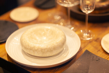 Close up on a table with luxury crockery, no people are visible.