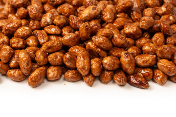Tasty sweet roasted peanuts as a background.