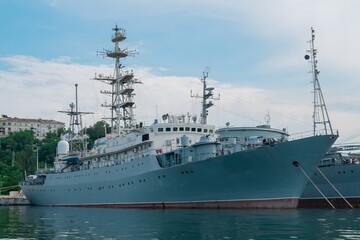 Fototapeta premium Warship is anchored at the pier