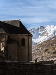Fototapeta premium Historic buildings in Briançon with mountain fortress view