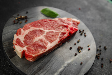 raw Pork steak escalope meat dish Fresh tasty food background on the table rustic food top view copy space